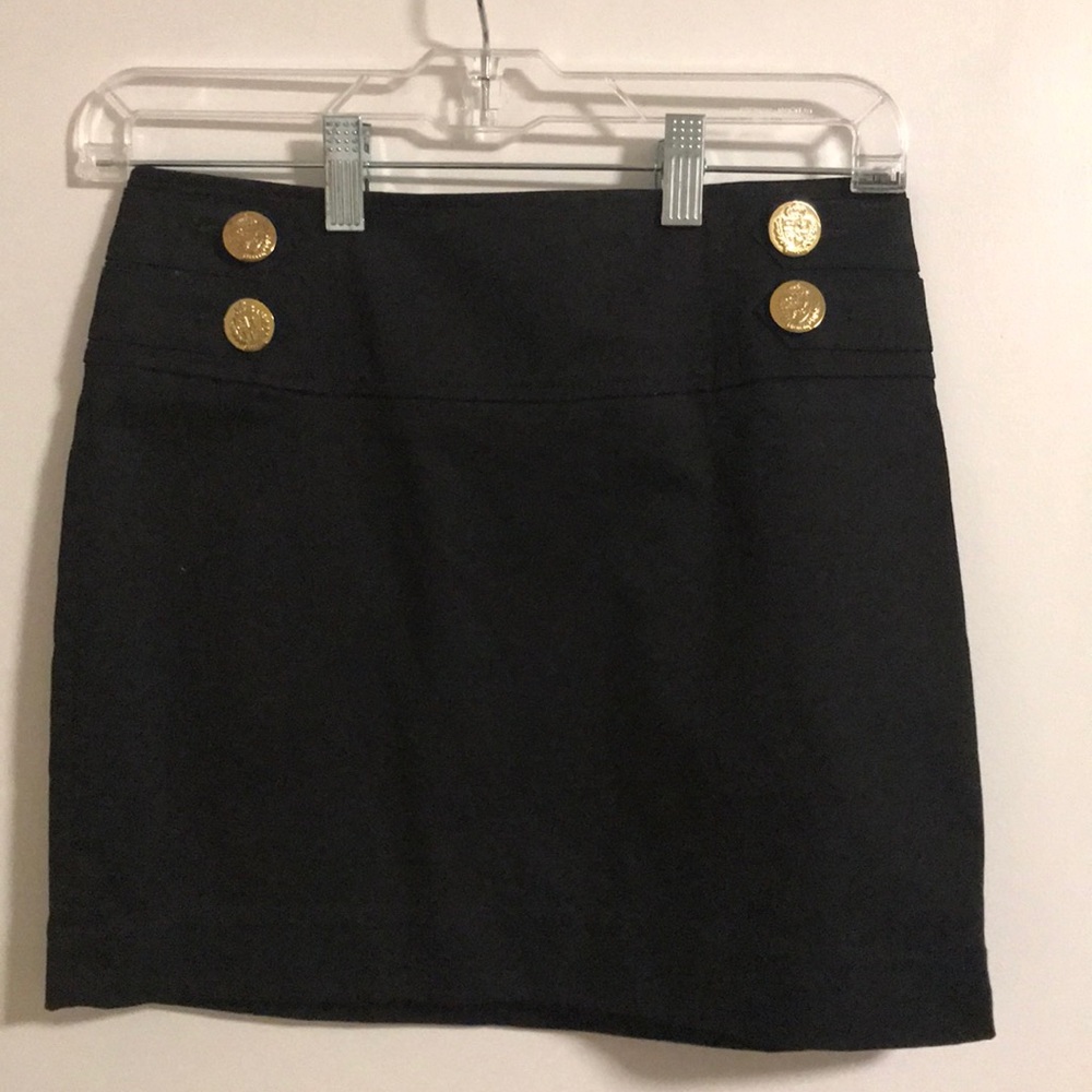 Black Express skirt with gold buttons